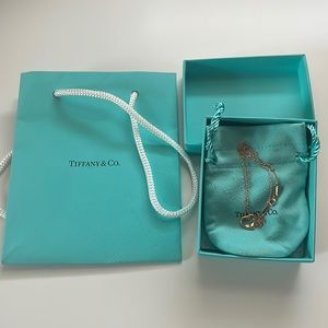 Tiffany Elsa Peretti Open Heart Pendant in Rose Gold.